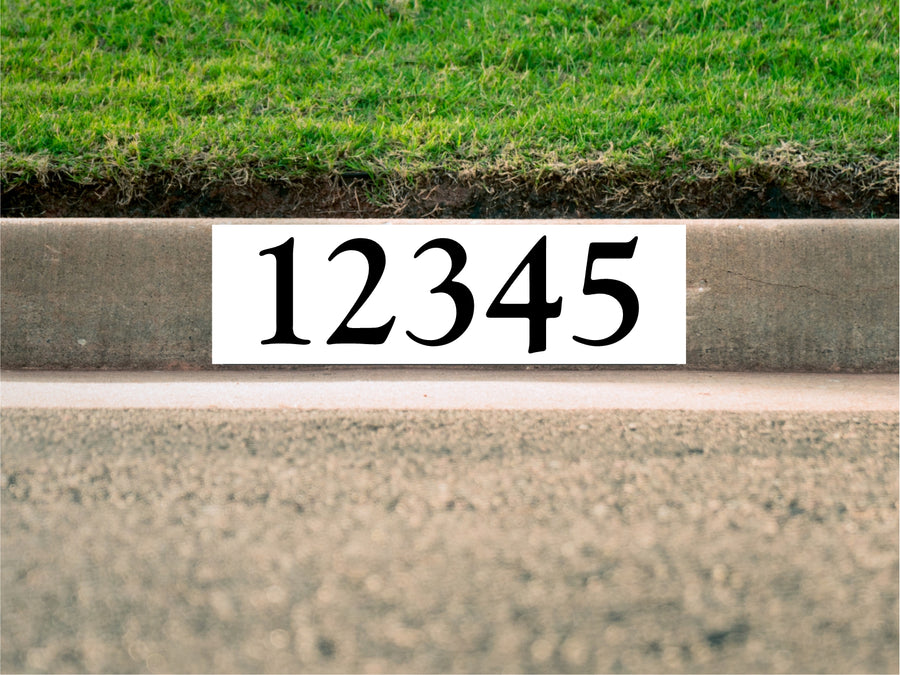 painted curb numbers